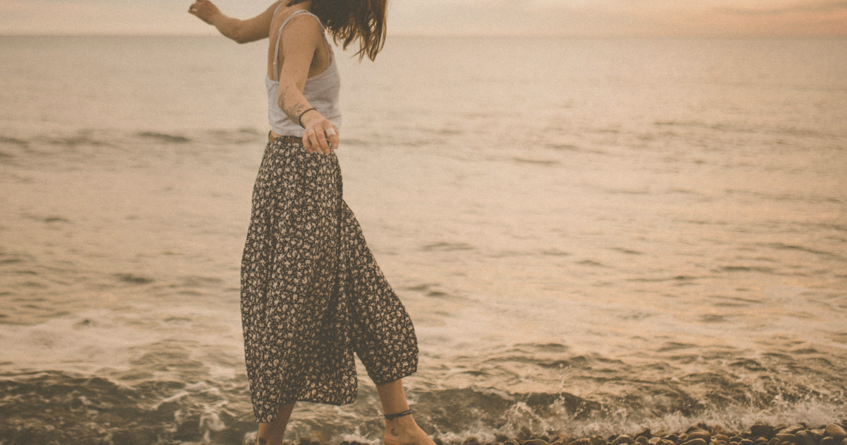 woman walking on the beach